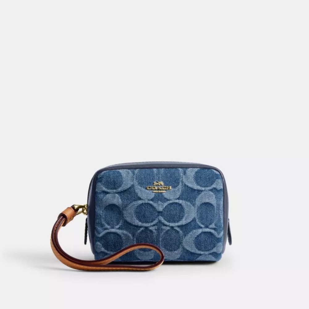 NWT Coach! Pouch Wristlet
In Signature Denim